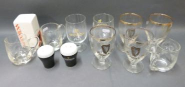 A quantity of Guinness collectables to include Carlton Ware salt, glasses,
