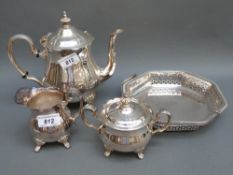 A plated tea set and a pierced octagonal basket,
