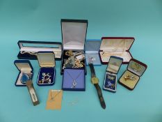 A collection of costume jewellery including pearls, Rotary watch, pendants,
