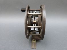 Mercury centrepin fishing reel and a Pfleuger Taxie single action example in original box