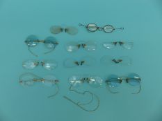 A collection of early spectacles/glasses including coloured lenses, gold plated, Georgian,