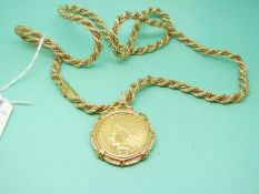 An 18ct gold bi-colour rope twist pendant necklace with 1912 Indian head 10 dollar gold coin (clip