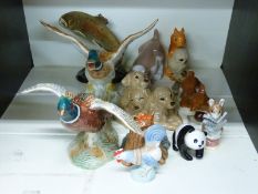 A collection of ceramics to include Beswick pheasant and duck figures, panda,