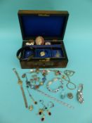 A collection of costume jewellery to include a moss agate pin, bracelets,