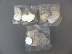 Three sealed bags of Squirrel Nutkins 50 pence uncirculated coins,
