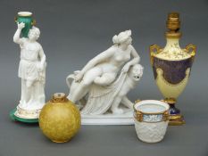 Royal Worcester vase stamped 1039, Coalport urn lamp, Parian figure of a naked lady riding a lion,