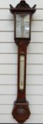 Troughton & Simms 19thC mahogany stick barometer with carved and turned decoration to case.