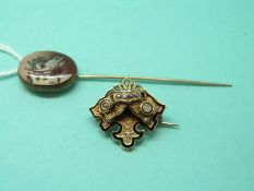 A yellow metal Victorian mourning locket set with black enamel and seed pearls with engraved