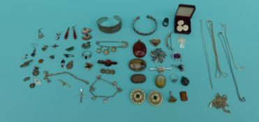 A collection of silver jewellery to include necklaces, brooches, a Victorian paste brooch, kilt pin,