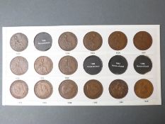 A collection of UK pennies and farthings,