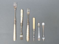 Three mother-of-pearl-handled hallmarked silver pickle forks, two Sheffield 1889 one Sheffield 1893,