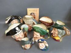 Six Royal Doulton character toby jugs and two smaller examples