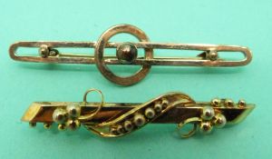 A 9ct gold brooch with sphere decoration and a yellow metal brooch