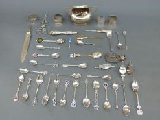 A quantity of hallmarked silver and white metal collectors' spoons, weight 122g all in,