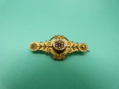 A 9ct gold brooch set with seed pearls