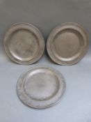 A set of three 18thC pewter side plates with London touch marks and maker's mark possibly for Home,