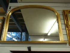A gilt-framed overmantel mirror,