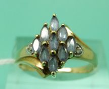 A 9ct gold ring set with quartz and diamonds (size Q)