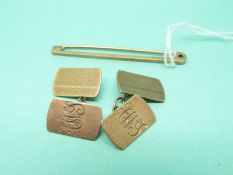 A pair of 9ct gold engine turned cufflinks and a 9ct gold tie pin, 7.