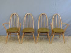 Four (2+2) Ercol light elm dining chairs