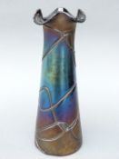A Loetz/Kralic iridescent glass vase of tapering form with trailed decoration and frilled rim, 22.