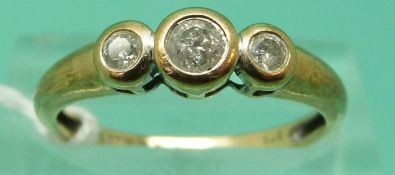 A 9ct gold ring set with three diamonds, total diamond weight approximately 0.