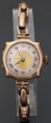 9ct gold ladies wristwatch with Roman numerals, gold engine turned face,