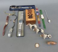 A collection of various ladies and gentleman's wristwatches including Swatch, Tommy Hilfiger,