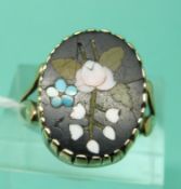 A Victorian ring set with a pietra dura plaque depicting flowers (size J)