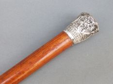 Indian white metal topped walking cane, height 89.