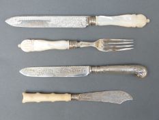 A Victorian hallmarked silver mother of pearl handled knife and fork, Sheffield 1894 and 1897,