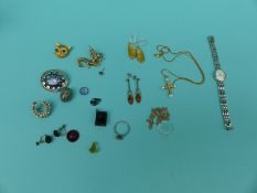 An earring set with a diamond, paste brooch, silver earrings, silver ring, silver Rotary watch,