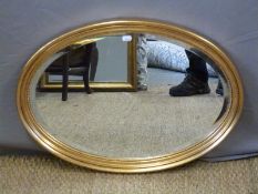Two gilt framed mirrors,