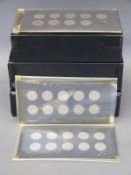 An amateur collection of English 1960s sixpences and dodecagonal threepenny pieces mounted on cards,