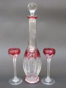 Flash overlaid cut glass cordial set with cranberry staining over clear ground,