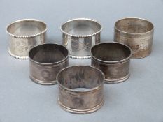 Six various hallmarked silver napkin rings,