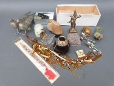 A collection of items to include a lighter in the form of a pistol, other lighters, plated pheasant,