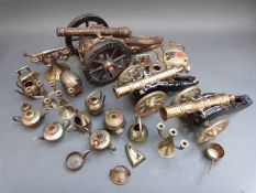 A quantity of brass items to include miniature tea pots, irons, telephones etc,