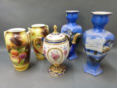 A pair of Japanese painted fruit vases,