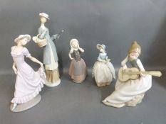 Nao figures including lady with basket and parasol, guitar player, lady holding her dress etc.
