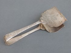 A pair of Victorian hallmarked silver asparagus servers, Sheffield 1899, maker Atkin Brothers,