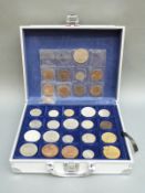 A collector's case containing an amateur collection of UK and overseas coinage to include a Roman