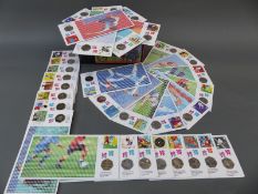 A boxed set of The Royal Mint / Royal Mail 2012 Olympic and Paralympic 50 pence coins and stamp