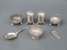 A pair of Victorian hallmarked silver wrythen peppers, B'ham 1880,