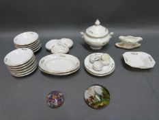 A child's tea set and two paperweights