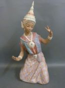 A Lladro figure of an Indian dancer in bisque finish