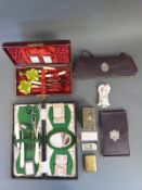 Two travelling sewing sets, two needle cases,