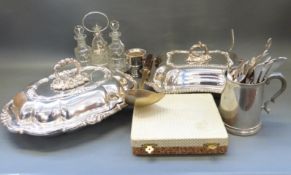 A collection of silver plated items including entree dishes, four-bottle cruet,