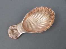 A hallmarked silver caddy spoon