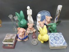 A collection of ceramics and glass to include Wade Nat West pigs, Sylvac style rabbits,